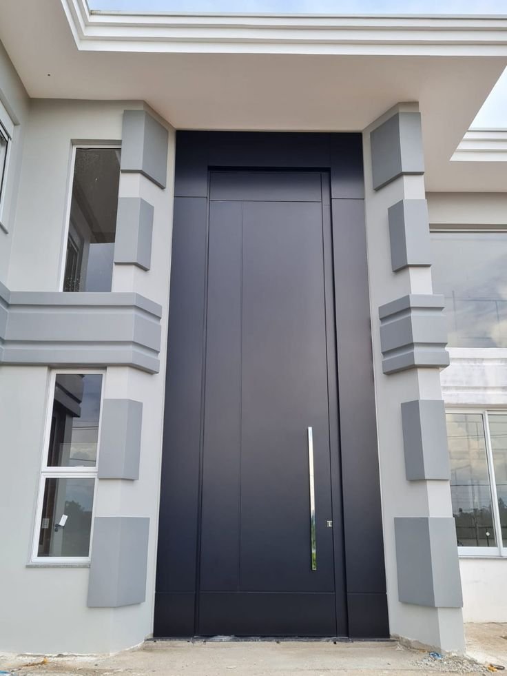 Porta em ACM — projeto residencial